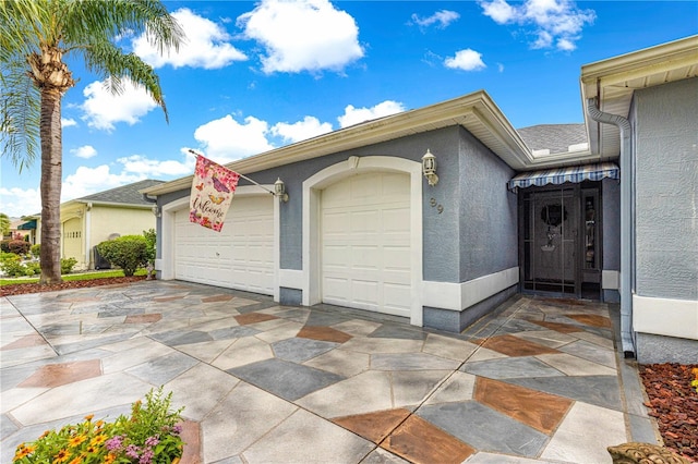 89 Palermo Pl, The Villages, FL 32159 - garage with concrete driveway