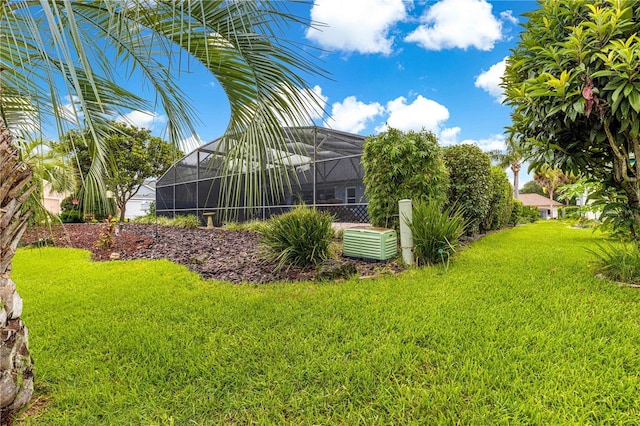 89 Palermo Pl, The Villages, FL 32159 - view of grassy yard featuring glass enclosure