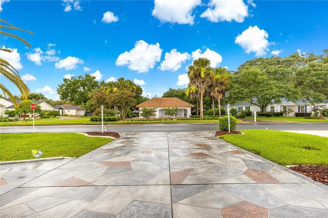 89 Palermo Pl, The Villages, FL 32159 - view of front facade featuring a front yard and a residential view