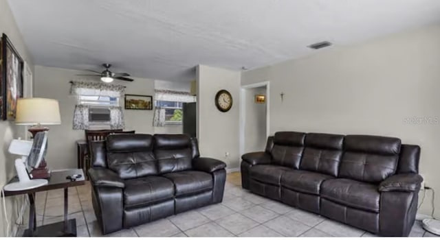 5912 Navajo Way, Orlando, FL 32807 - living room with a ceiling fan and light tile patterned flooring