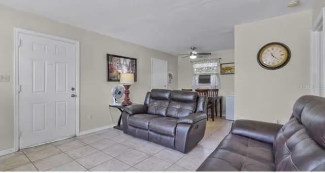 5912 Navajo Way, Orlando, FL 32807 - living area with light tile patterned flooring and ceiling fan