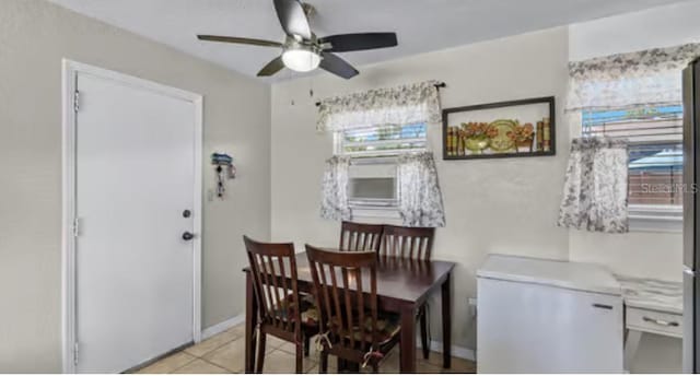 5912 Navajo Way, Orlando, FL 32807 - dining room with a ceiling fan and light tile patterned flooring