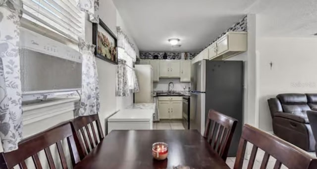 5912 Navajo Way, Orlando, FL 32807 - kitchen with freestanding refrigerator and a sink