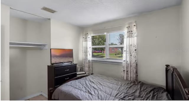 5912 Navajo Way, Orlando, FL 32807 - bedroom with radiator