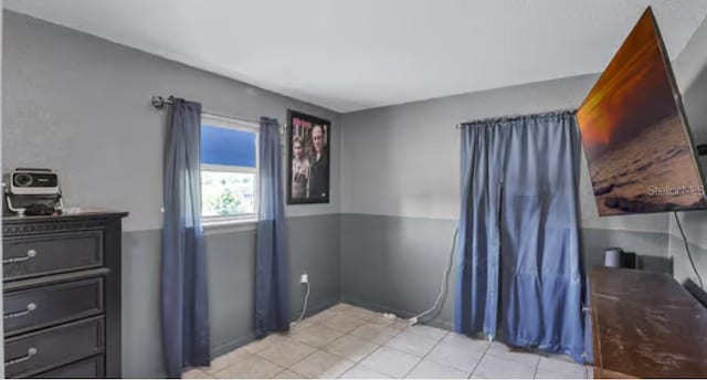 5912 Navajo Way, Orlando, FL 32807 - bedroom with light tile patterned floors