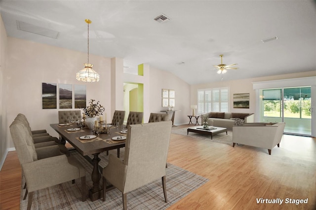 182 Palermo Pl, Lady Lake, FL 32159 - dining area featuring wood finished floors, vaulted ceiling, and ceiling fan