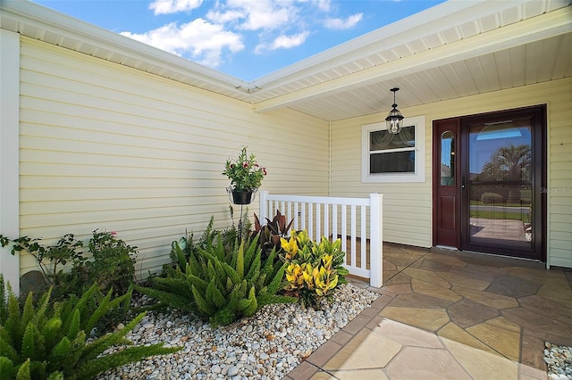 182 Palermo Pl, Lady Lake, FL 32159 - doorway to property featuring covered porch