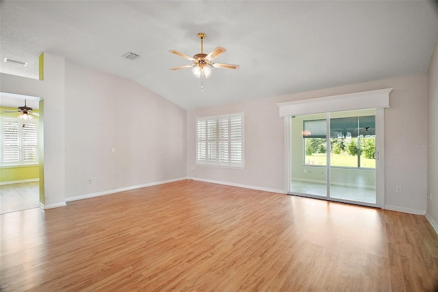 182 Palermo Pl, Lady Lake, FL 32159 - empty room featuring ceiling fan, vaulted ceiling, and light wood-type flooring