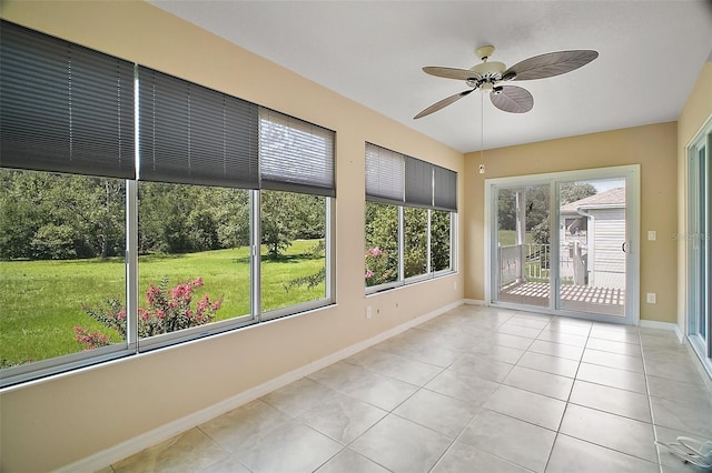 182 Palermo Pl, Lady Lake, FL 32159 - unfurnished sunroom with ceiling fan and tile patterned flooring