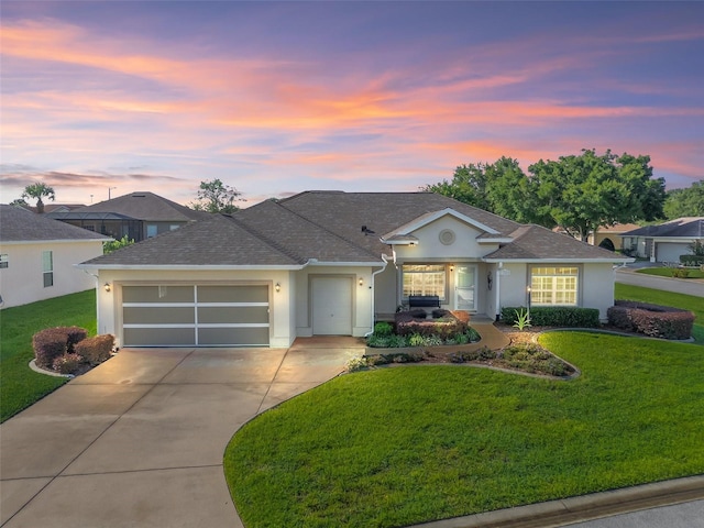 11092 SE 174th Loop, Summerfield, FL 34491 - ranch-style home with driveway, an attached garage, a yard, and stucco siding