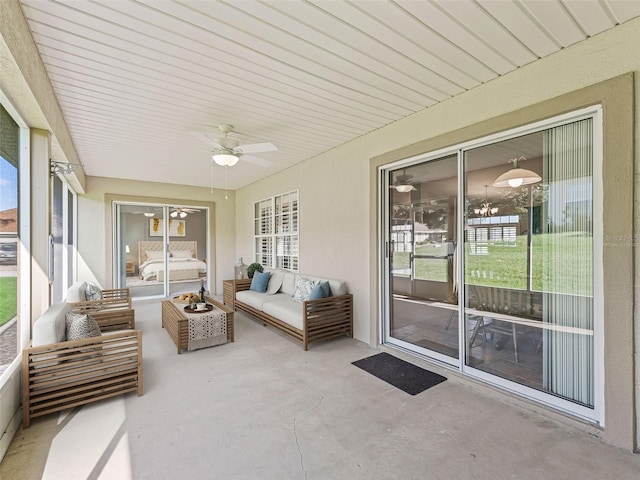 11092 SE 174th Loop, Summerfield, FL 34491 - sunroom featuring a ceiling fan and an outdoor hangout area