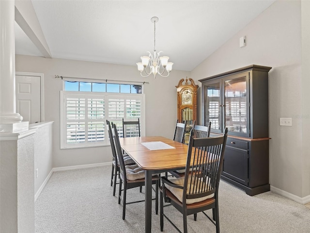 11092 SE 174th Loop, Summerfield, FL 34491 - dining space featuring a chandelier, light colored carpet, and vaulted ceiling