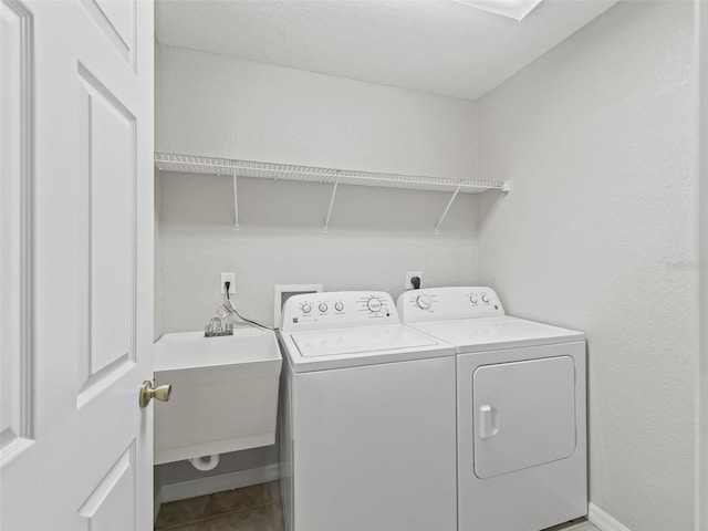 11092 SE 174th Loop, Summerfield, FL 34491 - washroom featuring washing machine and clothes dryer and tile patterned floors