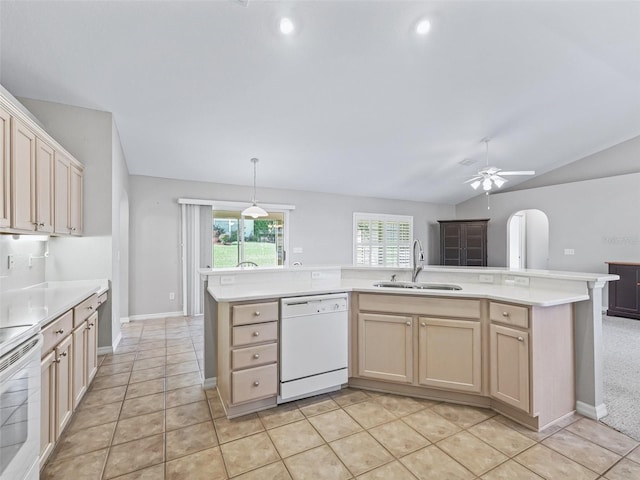 11092 SE 174th Loop, Summerfield, FL 34491 - kitchen with white appliances, light countertops, ceiling fan, vaulted ceiling, and arched walkways