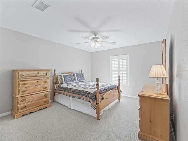 11092 SE 174th Loop, Summerfield, FL 34491 - bedroom featuring light colored carpet and a ceiling fan