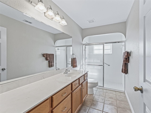 11092 SE 174th Loop, Summerfield, FL 34491 - bathroom with vanity, a stall shower, and tile patterned floors