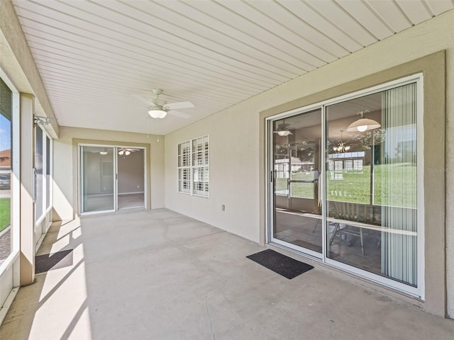 11092 SE 174th Loop, Summerfield, FL 34491 - unfurnished sunroom featuring a ceiling fan