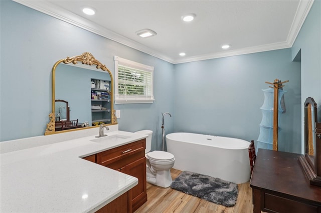 40535 Louise Rd, Umatilla, FL 32784 - full bathroom with vanity, wood finished floors, a soaking tub, ornamental molding, and recessed lighting