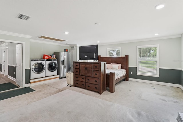 40535 Louise Rd, Umatilla, FL 32784 - bedroom with washing machine and clothes dryer, ornamental molding, stainless steel fridge with ice dispenser, light colored carpet, and recessed lighting