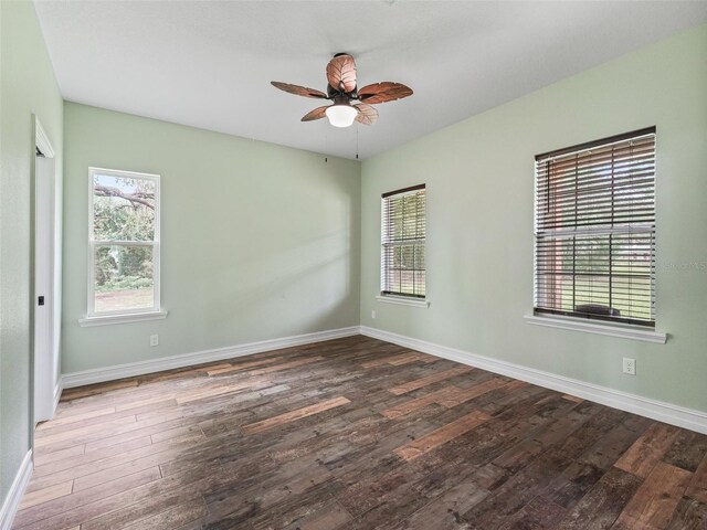 8567 Crk 635, Bushnell, FL 33513 - empty room with plenty of natural light, wood finished floors, and a ceiling fan