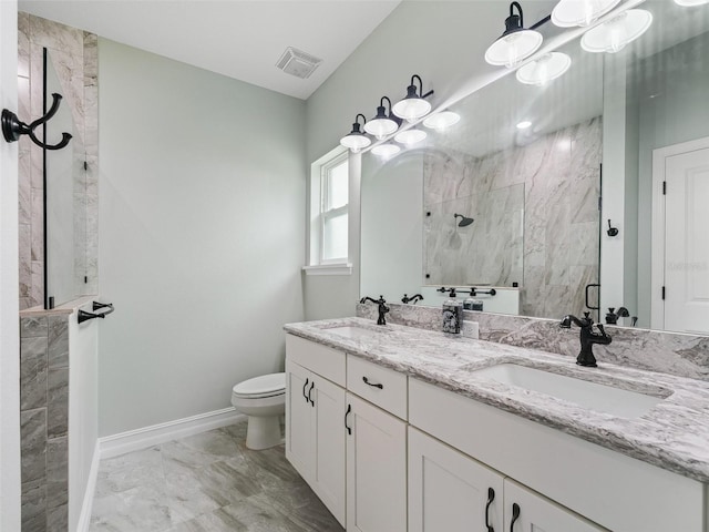 8567 Crk 635, Bushnell, FL 33513 - bathroom with marble finish flooring, tiled shower, and double vanity