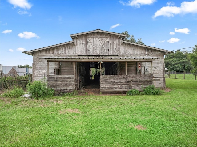 8567 Crk 635, Bushnell, FL 33513 - rear view of house with an outdoor structure, an exterior structure, and a barn