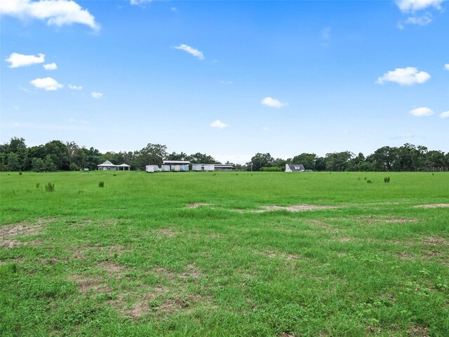 8567 Crk 635, Bushnell, FL 33513 - view of grassy yard featuring a view of rural / pastoral area