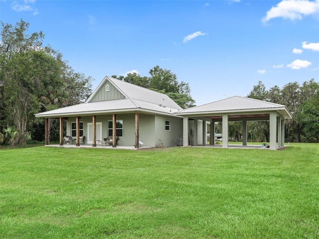 8567 Crk 635, Bushnell, FL 33513 - back of house featuring a patio area, a lawn, and a gazebo