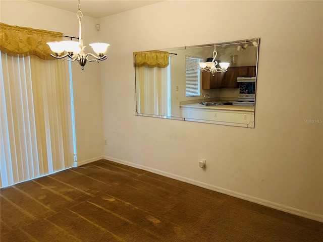 unfurnished dining area with a chandelier and dark colored carpet