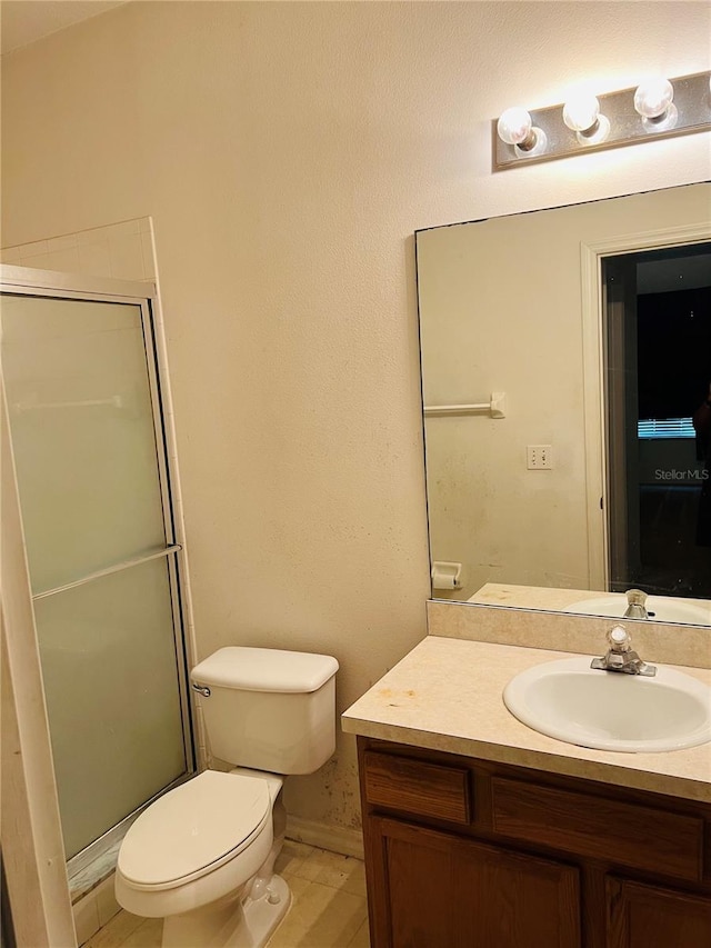 full bathroom with vanity and a shower stall