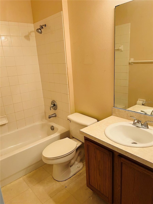 bathroom featuring vanity and  shower combination