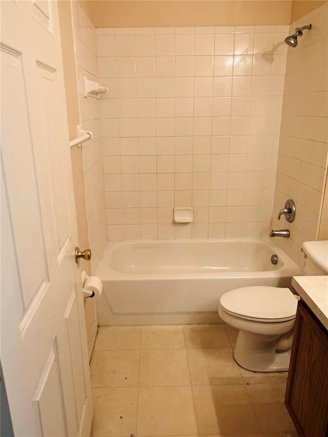 bathroom with vanity, bathtub / shower combination, and tile patterned floors