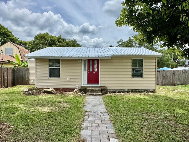 709 S Dixie Ave, Fruitland Park, FL 34731 - view of front facade featuring a metal roof
