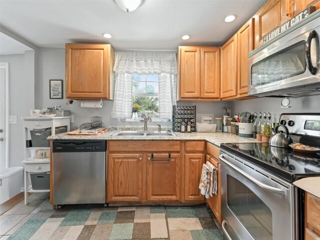709 S Dixie Ave, Fruitland Park, FL 34731 - kitchen with stainless steel appliances, recessed lighting, and light stone countertops