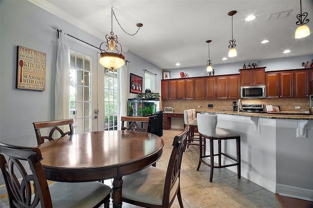 30230 Tokara Ter, Mount Dora, FL 32757 - dining room featuring recessed lighting, light tile patterned floors, and french doors