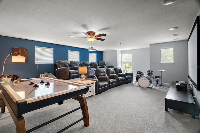 30230 Tokara Ter, Mount Dora, FL 32757 - recreation room with a ceiling fan, a textured ceiling, and carpet flooring