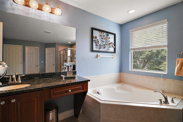 30230 Tokara Ter, Mount Dora, FL 32757 - full bath featuring a garden tub, vanity, and a stall shower