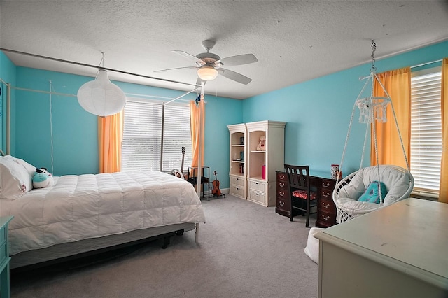 30230 Tokara Ter, Mount Dora, FL 32757 - bedroom featuring carpet floors, a ceiling fan, and a textured ceiling
