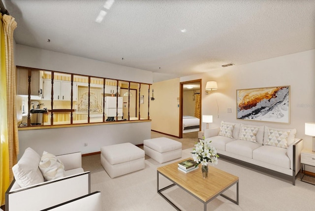 5268 Pinto Way, Orlando, FL 32810 - carpeted living room featuring a textured ceiling and baseboards