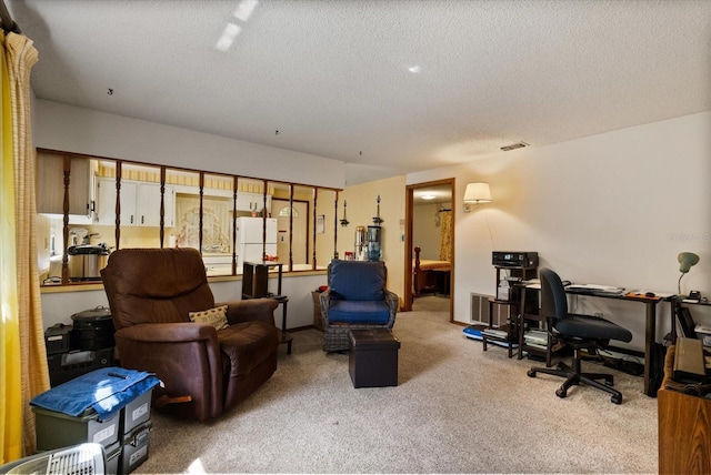 5268 Pinto Way, Orlando, FL 32810 - office area featuring carpet floors and a textured ceiling