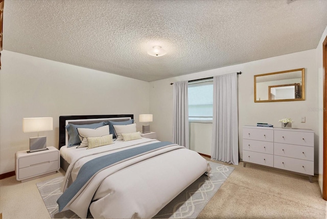 5268 Pinto Way, Orlando, FL 32810 - bedroom featuring a textured ceiling and light carpet