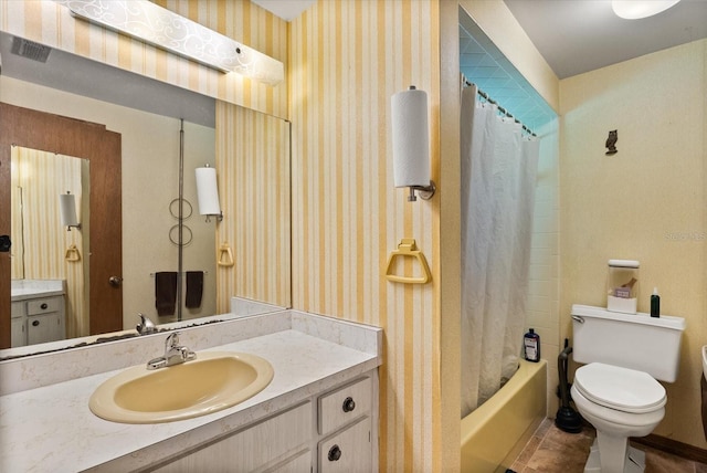5268 Pinto Way, Orlando, FL 32810 - full bath with vanity, shower / bathtub combination with curtain, wallpapered walls, and tile patterned flooring