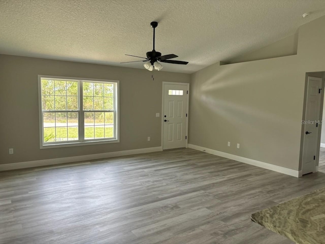 6805 N Sandborn Loop, Citrus Springs, FL 34433 - foyer with a ceiling fan, wood finished floors, and a textured ceiling