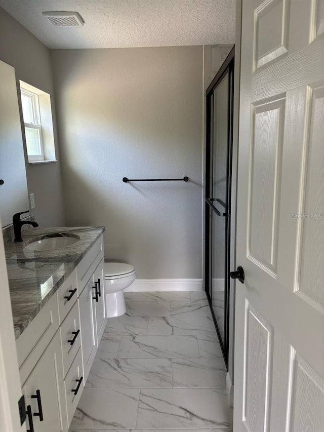 6805 N Sandborn Loop, Citrus Springs, FL 34433 - bathroom with vanity, marble finish floors, and a textured ceiling