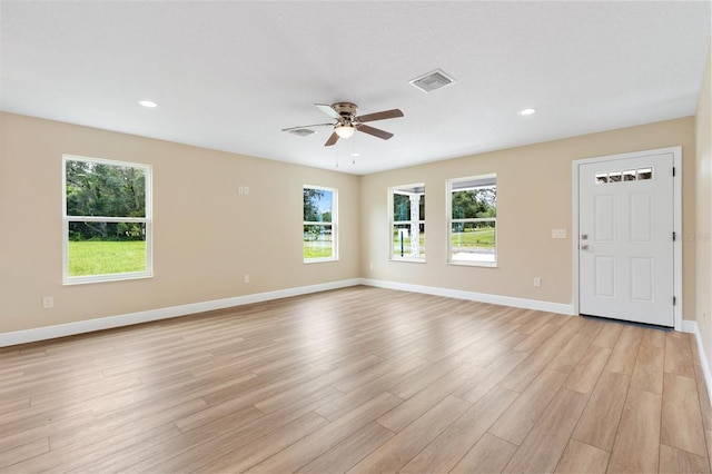 577 E Anderson Ave, Bushnell, FL 33513 - spare room featuring light wood-style flooring, a ceiling fan, healthy amount of natural light, and recessed lighting
