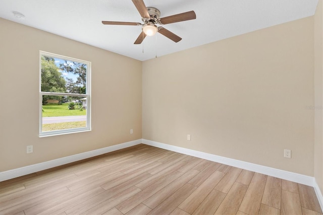577 E Anderson Ave, Bushnell, FL 33513 - spare room featuring light wood-style floors, ceiling fan, and a smoke detector
