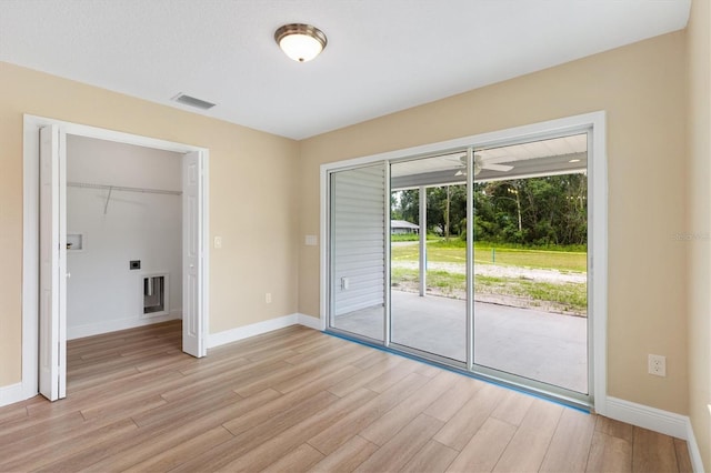 577 E Anderson Ave, Bushnell, FL 33513 - spare room with light wood finished floors and a ceiling fan