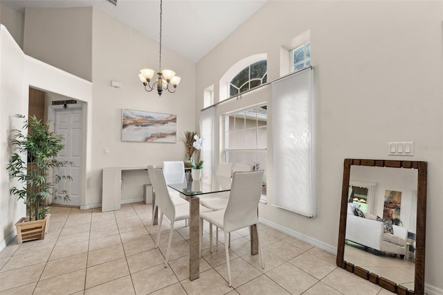 1532 Nightfall Dr, Clermont, FL 34711 - tiled dining space with high vaulted ceiling and a chandelier