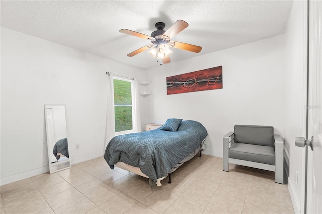 1532 Nightfall Dr, Clermont, FL 34711 - bedroom with a ceiling fan, tile patterned floors, and a textured ceiling