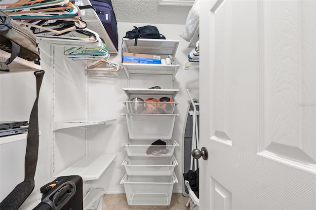 1532 Nightfall Dr, Clermont, FL 34711 - walk in closet with tile patterned flooring